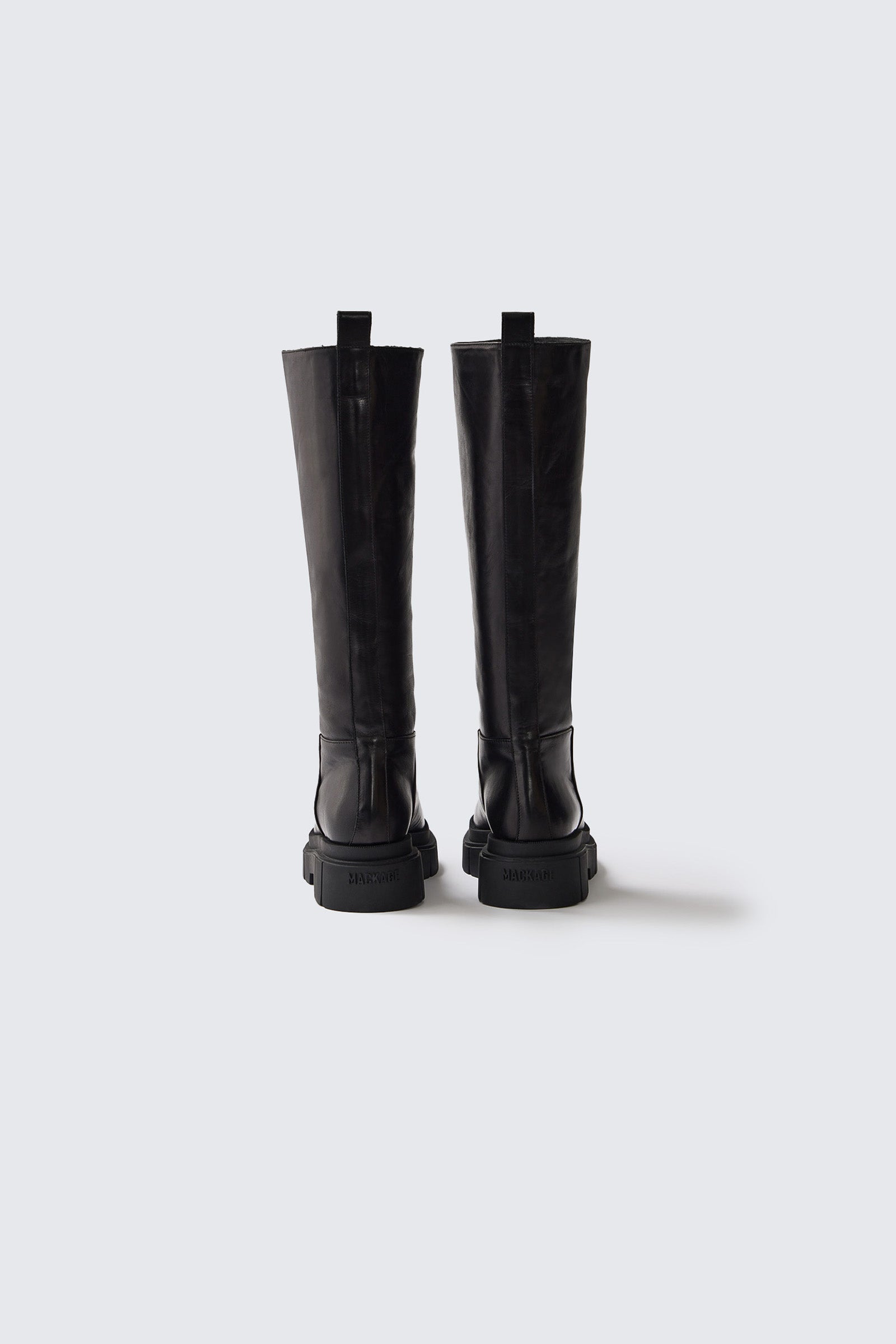 COMMANDER Shearling-lined lug sole Leather boot for Women