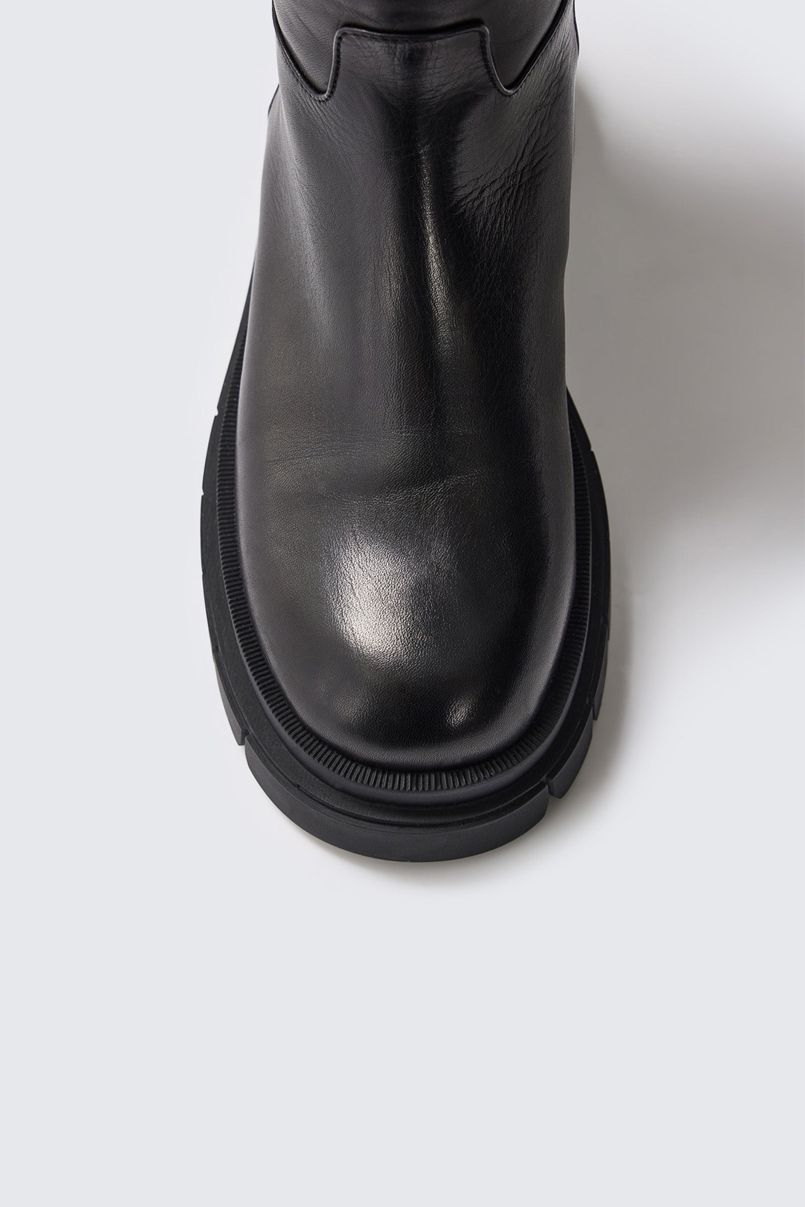 COMMANDER Shearling-lined lug sole Leather boot for Women