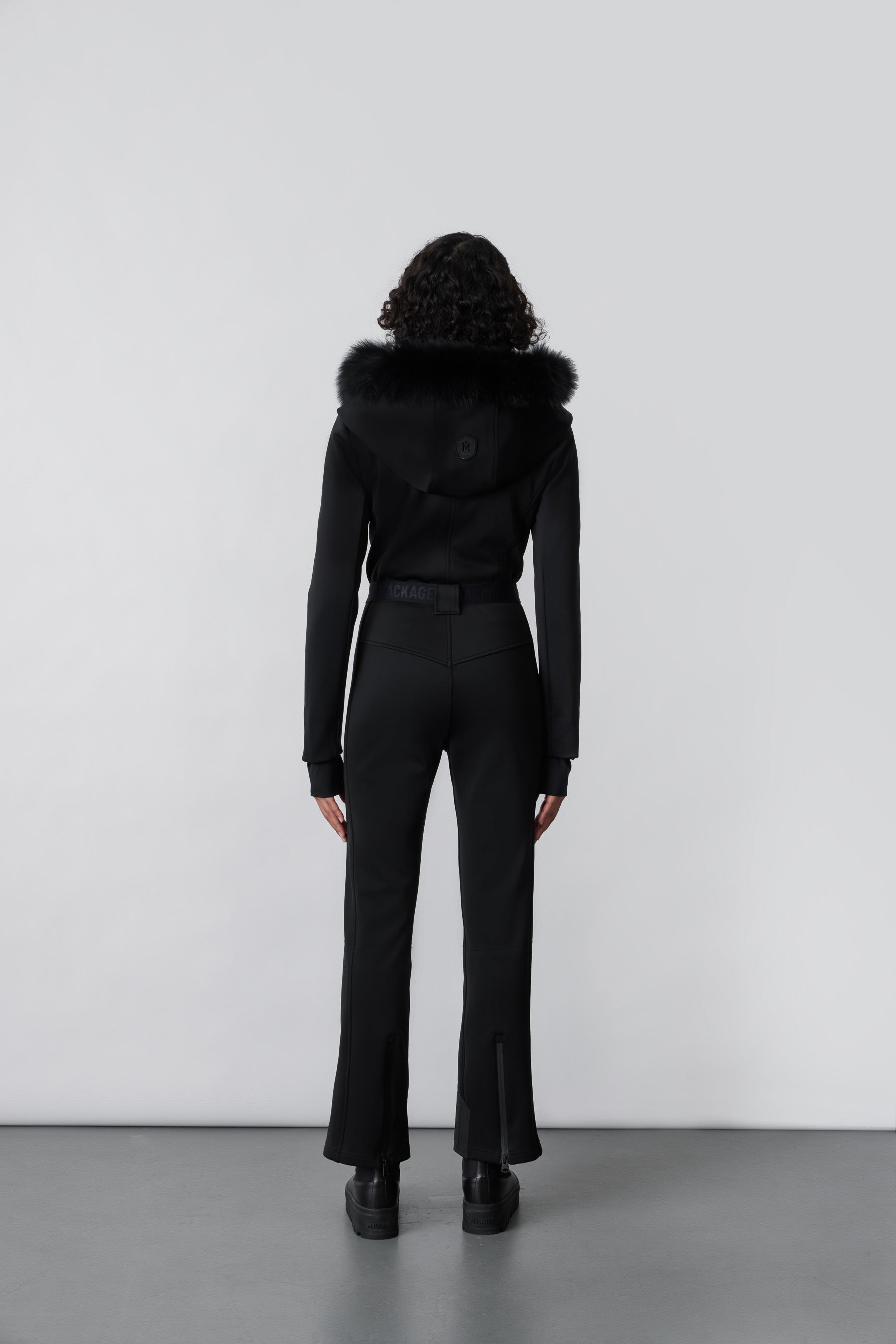 Elle, Techno fleece ski suit with removable hood and fur